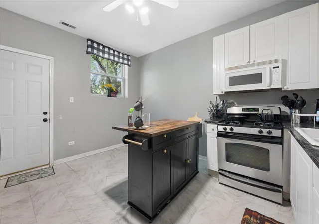 Photo 3 of Multi family home for sale at 3128 W Warren Blvd, Chicago, IL 60612 | MLS# 12758497 | Listing updated on 2026-09-16