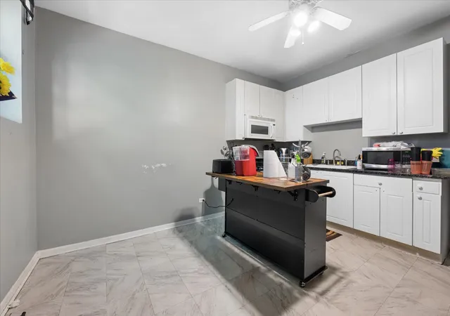 Photo 4 of Multi family home for sale at 3128 W Warren Blvd, Chicago, IL 60612 | MLS# 12758497 | Listing updated on 2026-09-16