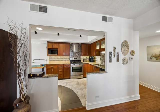 Photo 2 of Condo for sale at 8350 W Addison St #301, Chicago, IL 60634 | MLS# 12758871 | Listing updated on 2026-09-30
