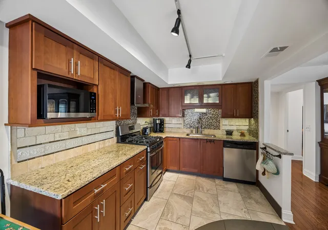 Photo 3 of Condo for sale at 8350 W Addison St #301, Chicago, IL 60634 | MLS# 12758871 | Listing updated on 2026-09-30