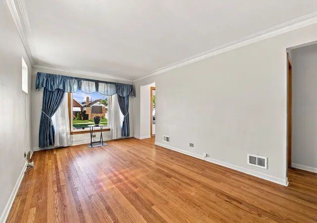Photo 4 of Single family home for sale at 6843 S Kedvale Ave, Chicago, IL 60629 | MLS# 12759514 | Listing updated on 2026-09-14