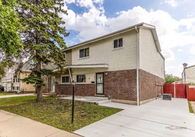 Photo 1 of Multi family home for sale at 9105 Hollyberry Ave, Des Plaines, IL 60016 | MLS# 12759777 | Listing updated on 2026-09-23