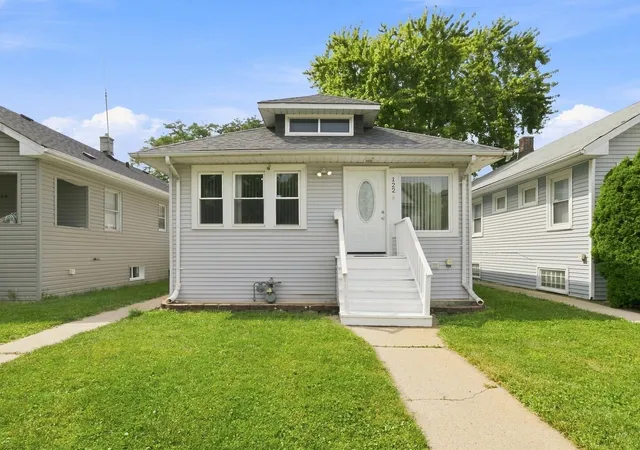 Photo 1 of Single family home for sale at 122 S 21st Avenue, Maywood, IL 60153 | MLS# 12759962 | Listing updated on 2026-09-23