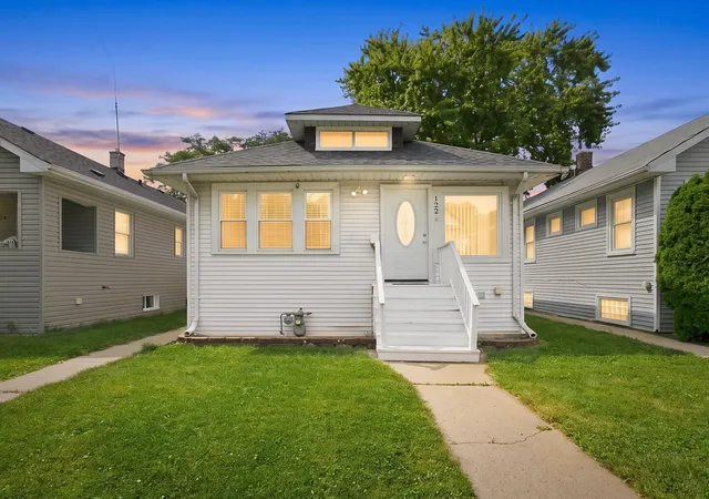 Photo 2 of Single family home for sale at 122 S 21st Avenue, Maywood, IL 60153 | MLS# 12759962 | Listing updated on 2026-09-23