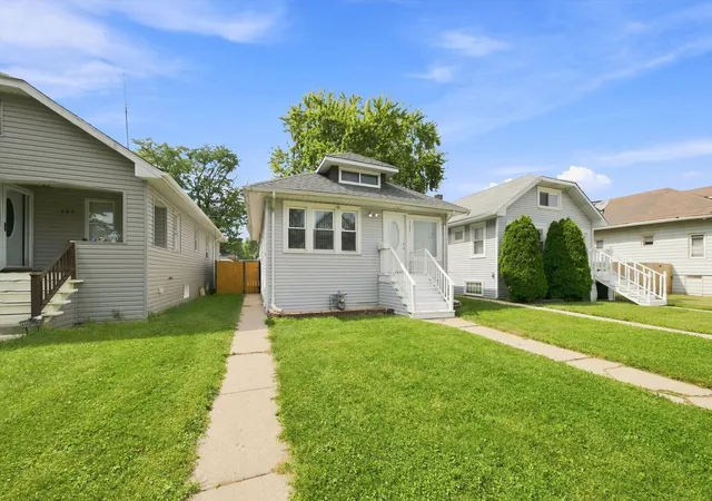 Photo 3 of Single family home for sale at 122 S 21st Avenue, Maywood, IL 60153 | MLS# 12759962 | Listing updated on 2026-09-23