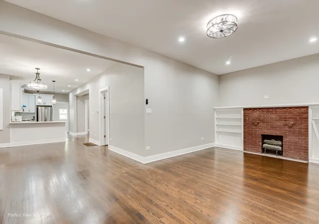 Photo 4 of Single family home for sale at 1128 N Lockwood Ave, Chicago, IL 60651 | MLS# 12760460 | Listing updated on 2026-09-23