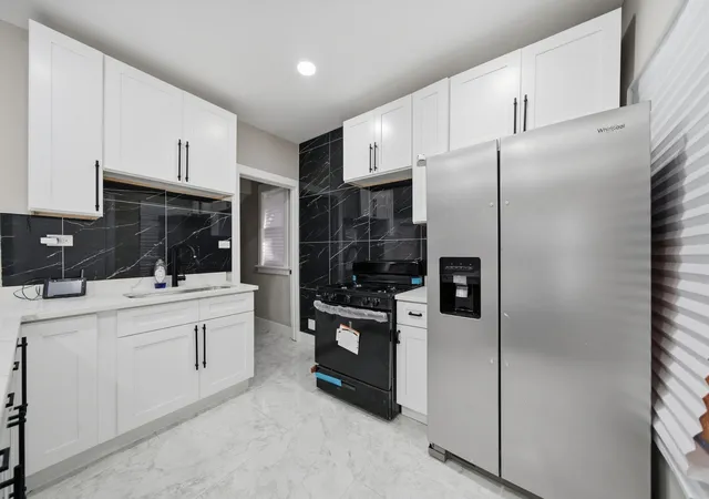 Photo 3 of Single family home for sale at 122 N Long Ave, Chicago, IL 60644 | MLS# 12760515 | Listing updated on 2026-09-21