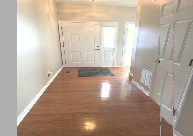 Photo 3 of Townhouse for sale at 1607 Cadillac Cir, Romeoville, IL 60446 | MLS# 12760681 | Listing updated on 2026-10-06