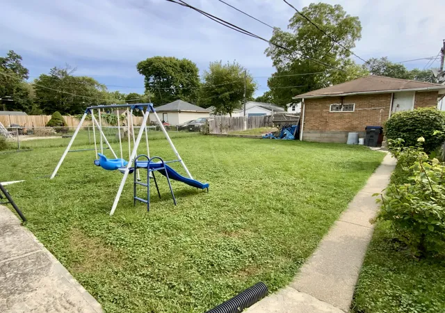 Photo 2 of Single family home for sale at 909 Prescott St, Waukegan, IL 60085 | MLS# 12760839 | Listing updated on 2026-09-22