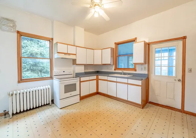 Photo 3 of Single family home for sale at 2221 N Lamon Ave, Chicago, IL 60639 | MLS# 12761043 | Listing updated on 2026-09-23