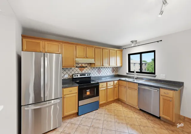 Photo 2 of Condo for sale at 2215 Nichols Rd #21F, Arlington Heights, IL 60004 | MLS# 12761098 | Listing updated on 2026-09-22