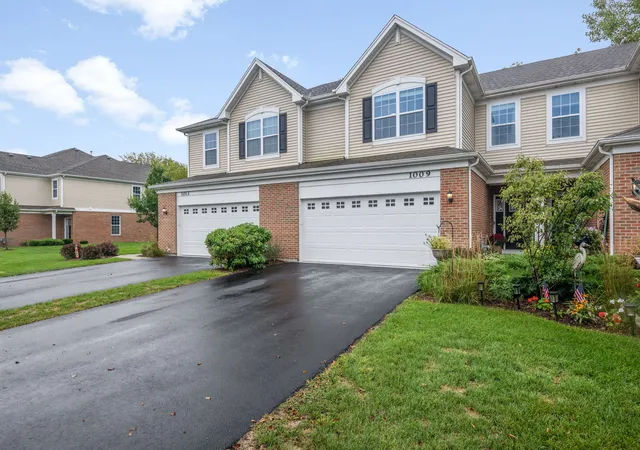 Photo 1 of Townhouse for sale at 1009 Draper Rd, Mc Henry, IL 60050 | MLS# 12762239 | Listing updated on 2026-09-24