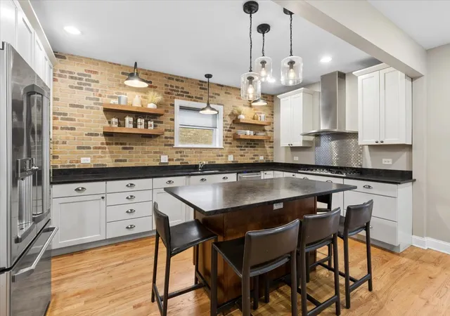 Photo 3 of Single family home for sale at 2442 W Berenice Ave, Chicago, IL 60618 | MLS# 12762274 | Listing updated on 2026-10-27