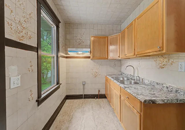 Photo 4 of Single family home for sale at 411 N Arlington Hts Rd, Arlington Heights, IL 60004 | MLS# 12762545 | Listing updated on 2026-09-24