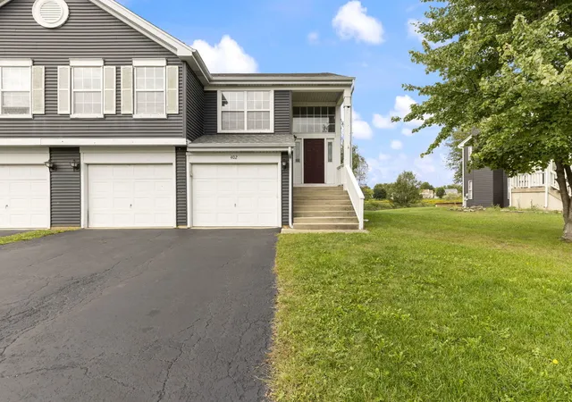 Photo 1 of Multi family home for sale at 402 Gloria Ln, Oswego, IL 60543 | MLS# 12762844 | Listing updated on 2026-09-30