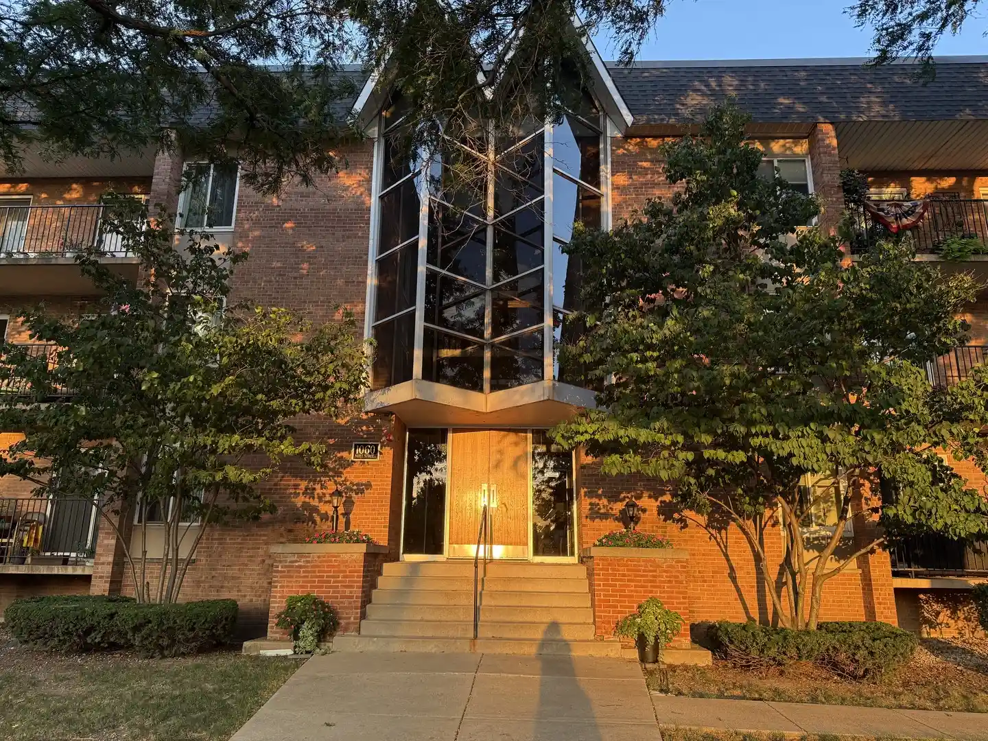 Listing Photo 1 - Condo for sale in 1060 N Mill St located at 1060 N Mill St, Naperville, IL 60563 - Unit #211