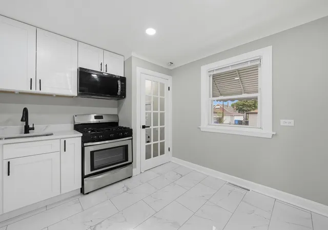 Photo 3 of Single family home for sale at 11025 S Avenue O, Chicago, IL 60617 | MLS# 12764344 | Listing updated on 2026-09-20