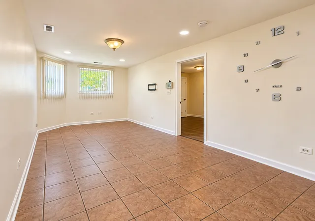 Photo 2 of Condo for sale at 1229 N Austin Blvd #1, Chicago, IL 60651 | MLS# 12764494 | Listing updated on 2026-09-19