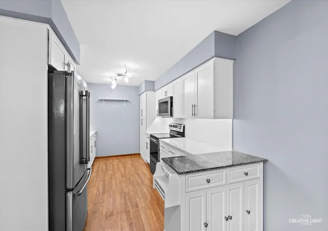 Photo 1 of Condo for sale at 450 W Downer Pl #2A, Aurora, IL 60506 | MLS# 12765034 | Listing updated on 2026-09-21