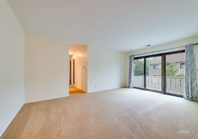 Photo 3 of Townhouse for sale at 404 Sandalwood Ln #A2, Schaumburg, IL 60193 | MLS# 12765577 | Listing updated on 2026-10-08