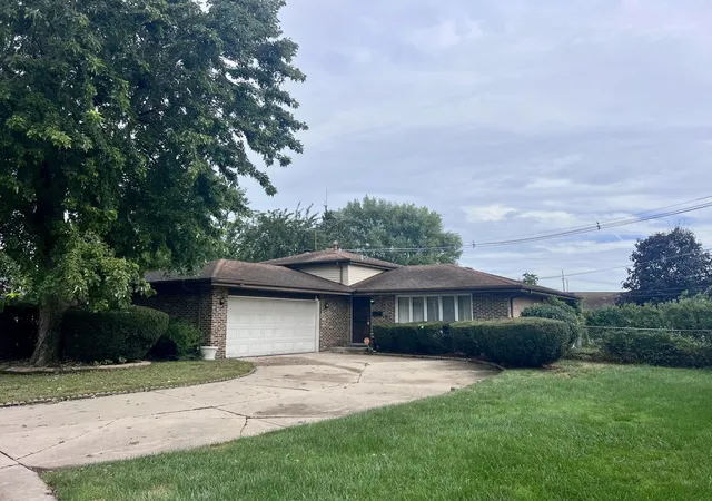 Photo 1 of Single family home for sale at 15035 Naughton Dr, South Holland, IL 60473 | MLS# 12765750 | Listing updated on 2026-09-21