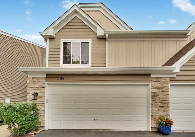 Photo 1 of Townhouse for sale at 408 Locksley Dr, Streamwood, IL 60107 | MLS# 12765858 | Listing updated on 2026-09-30