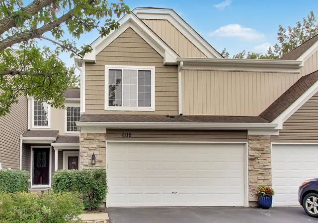 Photo 2 of Townhouse for sale at 408 Locksley Dr, Streamwood, IL 60107 | MLS# 12765858 | Listing updated on 2026-09-30