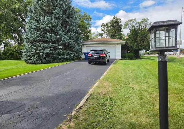 Photo 2 of Single family home for sale at 20w511 Army Trl Blvd, Addison, IL 60101 | MLS# 12765920 | Listing updated on 2026-09-23