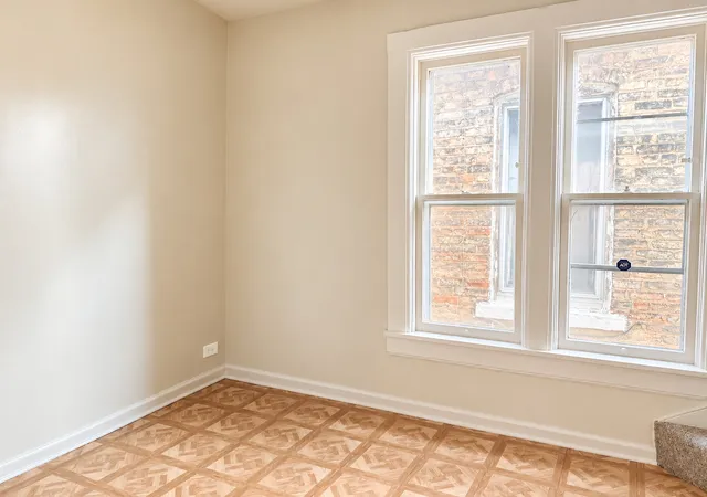 Photo 4 of Single family home for sale at 909 N Homan Ave, Chicago, IL 60651 | MLS# 12765932 | Listing updated on 2026-09-23
