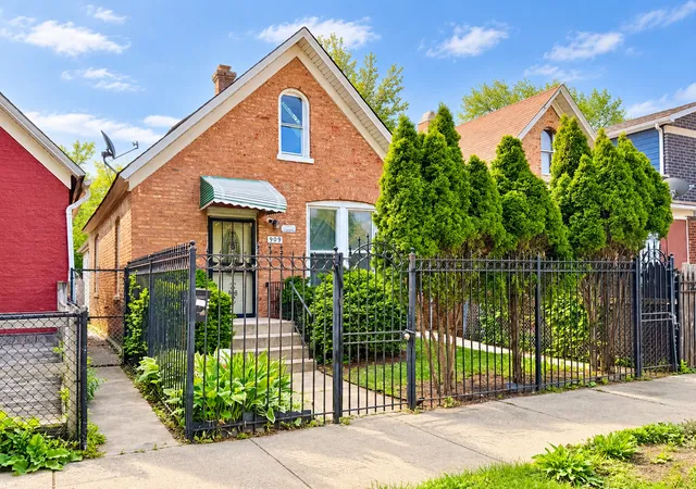 Single family home for sale at 909 N Homan Ave, Chicago, IL 60651 | MLS# 12765932