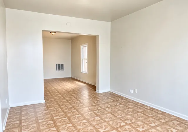 Photo 1 of Single family home for sale at 909 N Homan Ave, Chicago, IL 60651 | MLS# 12765932 | Listing updated on 2026-09-23
