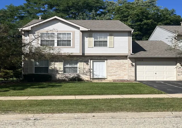 Photo 1 of Townhouse for sale at 1404 W Split Oak Cir, Round Lake Beach, IL 60073 | MLS# 12766468 | Listing updated on 2026-09-28