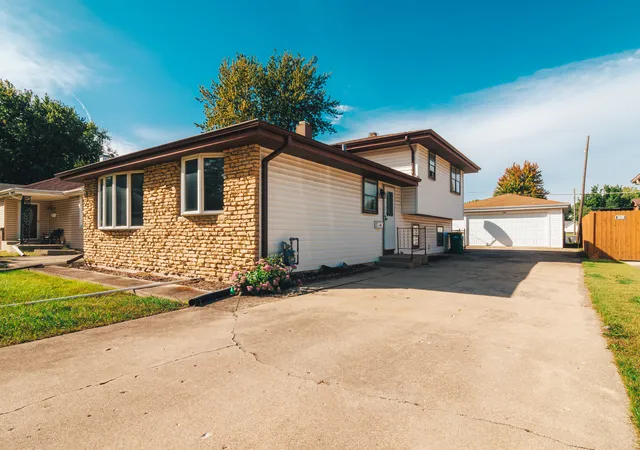 Single family home for sale at 2307 Douglas St, Joliet, IL 60435 | MLS# 12767295