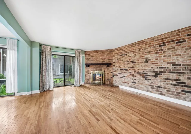 Photo 3 of Townhouse for sale at 105 W Dover Dr, Mount Prospect, IL 60056 | MLS# 12767548 | Listing updated on 2026-09-29