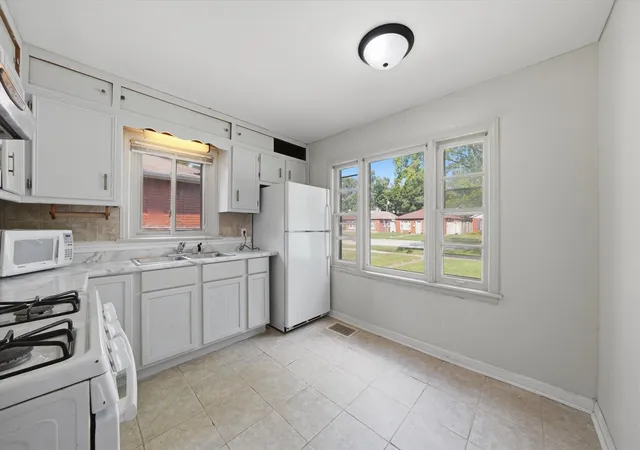 Photo 4 of Single family home for sale at 14840 Langley Ave, Dolton, IL 60419 | MLS# 12767796 | Listing updated on 2026-10-08