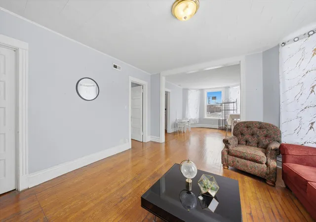 Photo 2 of Multi family home for sale at 7514 S Dante Ave, Chicago, IL 60619 | MLS# 12767847 | Listing updated on 2026-09-29