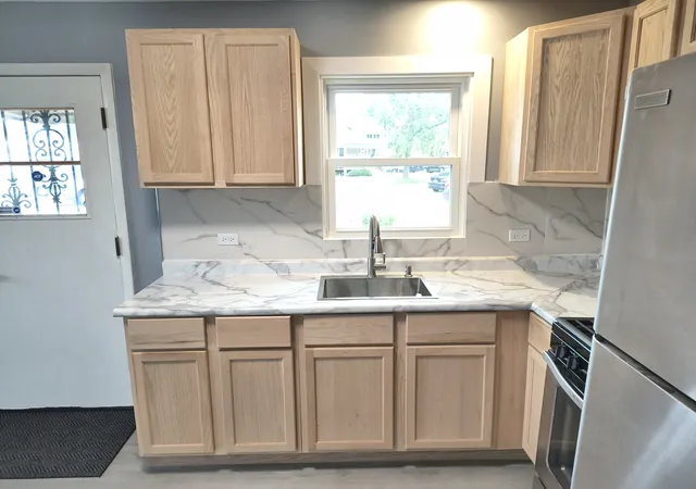 Photo 3 of Single family home for sale at 521 Jefferson St, Dolton, IL 60419 | MLS# 12767904 | Listing updated on 2026-09-23