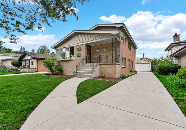 Single family home for sale at 14733 Atlantic Ave, Dolton, IL 60419 | MLS# 12768308