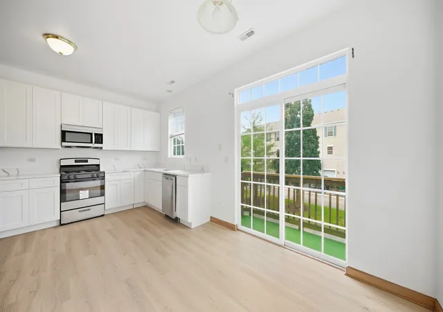 Photo 4 of Townhouse for sale at 240 S Alder Crk Dr, Romeoville, IL 60446 | MLS# 12768353 | Listing updated on 2026-09-30