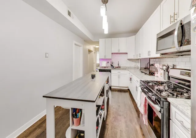 Photo 3 of Multi family home for sale at 1431 N Springfield Ave, Chicago, IL 60651 | MLS# 12768922 | Listing updated on 2026-09-25
