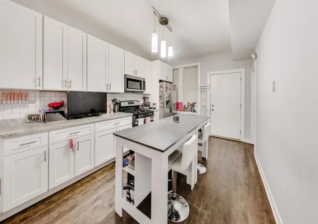 Photo 4 of Multi family home for sale at 1431 N Springfield Ave, Chicago, IL 60651 | MLS# 12768922 | Listing updated on 2026-09-25