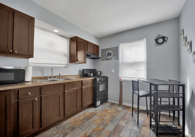 Photo 2 of Single family home for sale at 321 W 104th Place, Chicago, IL 60628 | MLS# 12768951 | Listing updated on 2026-09-25
