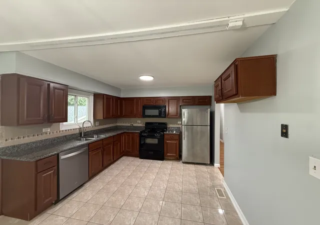 Photo 3 of Single family home for sale at 2341 Leeward Ln, Hanover Park, IL 60133 | MLS# 12769268 | Listing updated on 2026-09-25