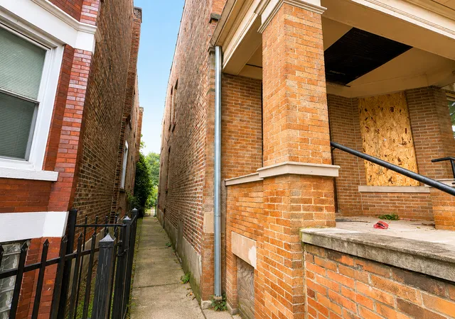 Photo 1 of Multi family home for sale at 7139 S Saint Lawrence Ave, Chicago, IL 60619 | MLS# 12769584 | Listing updated on 2026-09-25