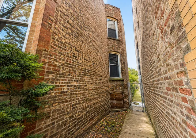 Photo 2 of Multi family home for sale at 7139 S Saint Lawrence Ave, Chicago, IL 60619 | MLS# 12769584 | Listing updated on 2026-09-25