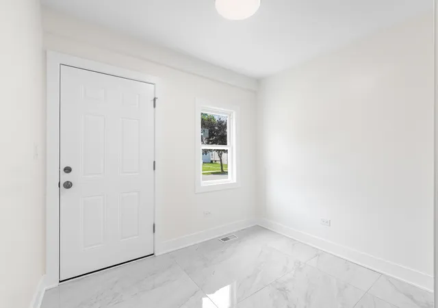 Photo 3 of Single family home for sale at 211 S 9th Avenue, Maywood, IL 60153 | MLS# 12770189 | Listing updated on 2026-10-02