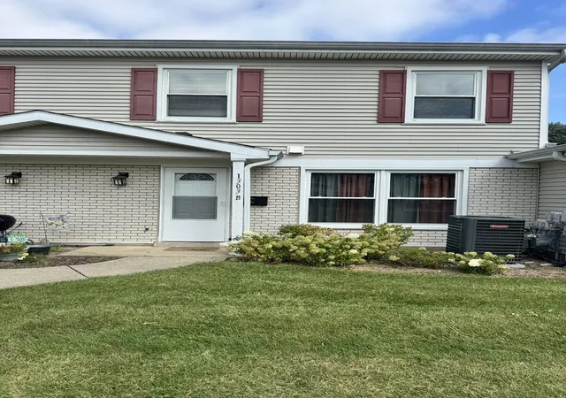 Photo 1 of Condo for sale at 1303 Kingsbury Dr #B, Hanover Park, IL 60133 | MLS# 12770210 | Listing updated on 2026-10-04