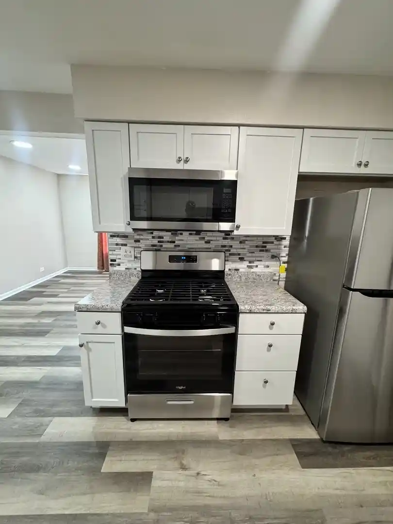Listing Photo 2 - Condo for sale in 1303 Kingsbury Dr located at 1303 Kingsbury Dr, Hanover Park, IL 60133 - Unit 1303 Kingsbury Dr