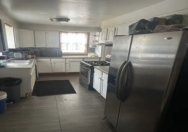 Photo 3 of Single family home for sale at 12207 S Harvard Ave, Chicago, IL 60628 | MLS# 12770477 | Listing updated on 2026-09-30