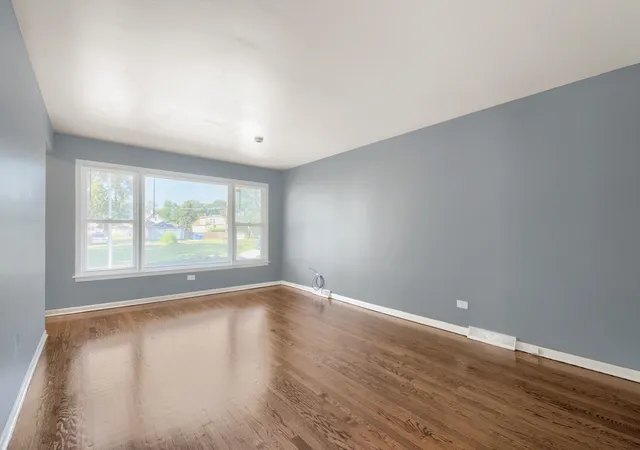 Photo 3 of Single family home for sale at 323 154th Place, Calumet City, IL 60409 | MLS# 12770601 | Listing updated on 2026-09-28